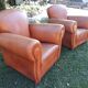 Paire de fauteuils club 1950