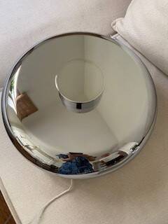 The "Bubble" table lamp in chrome finish, resulting from the collaboration.