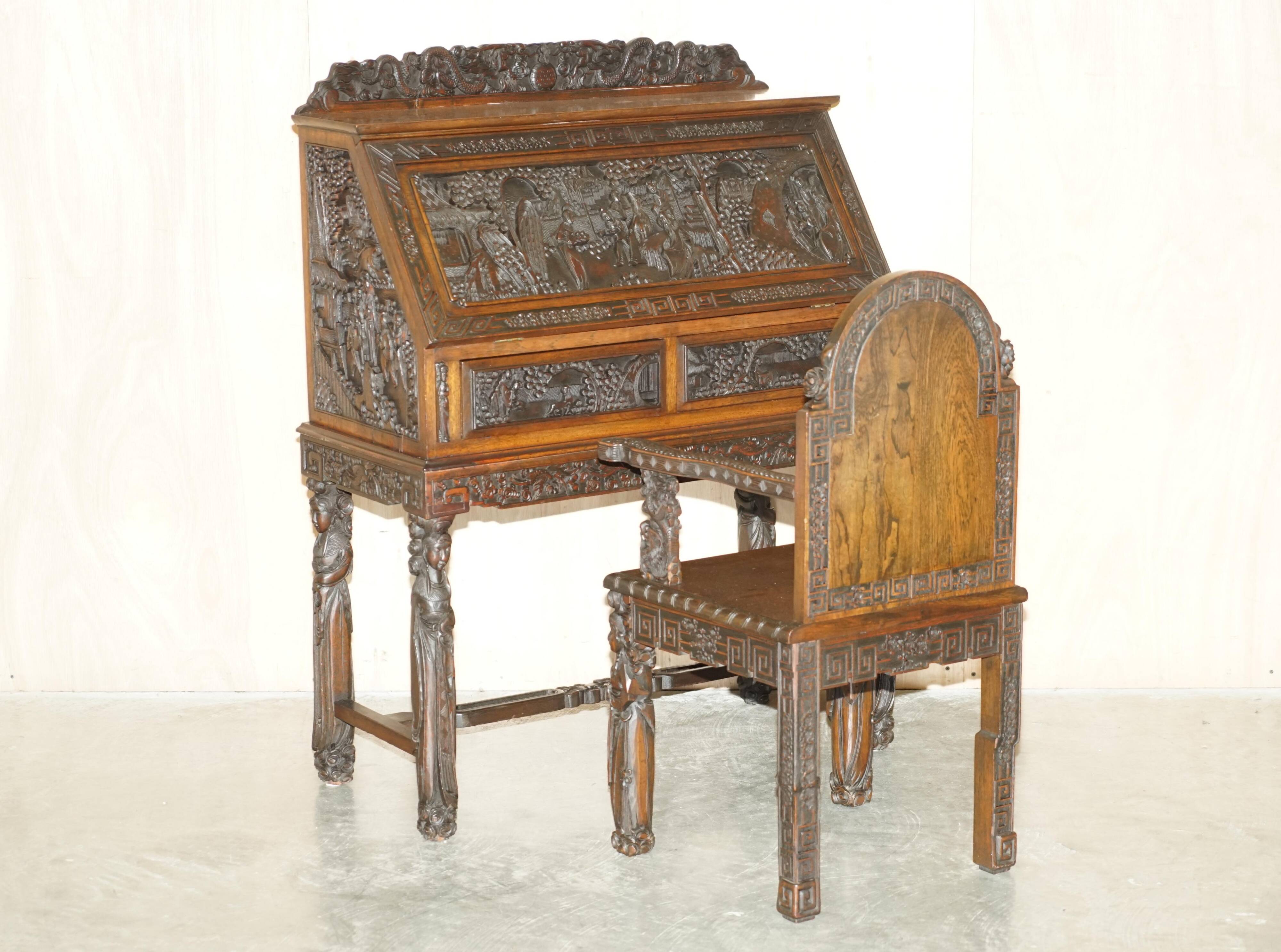 Chinese hand-carved desk from around 1940 with matching chair.
