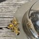 Silver-plated metal butter dish with knots