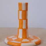 Pair of yellow and white checkered ceramic candlesticks