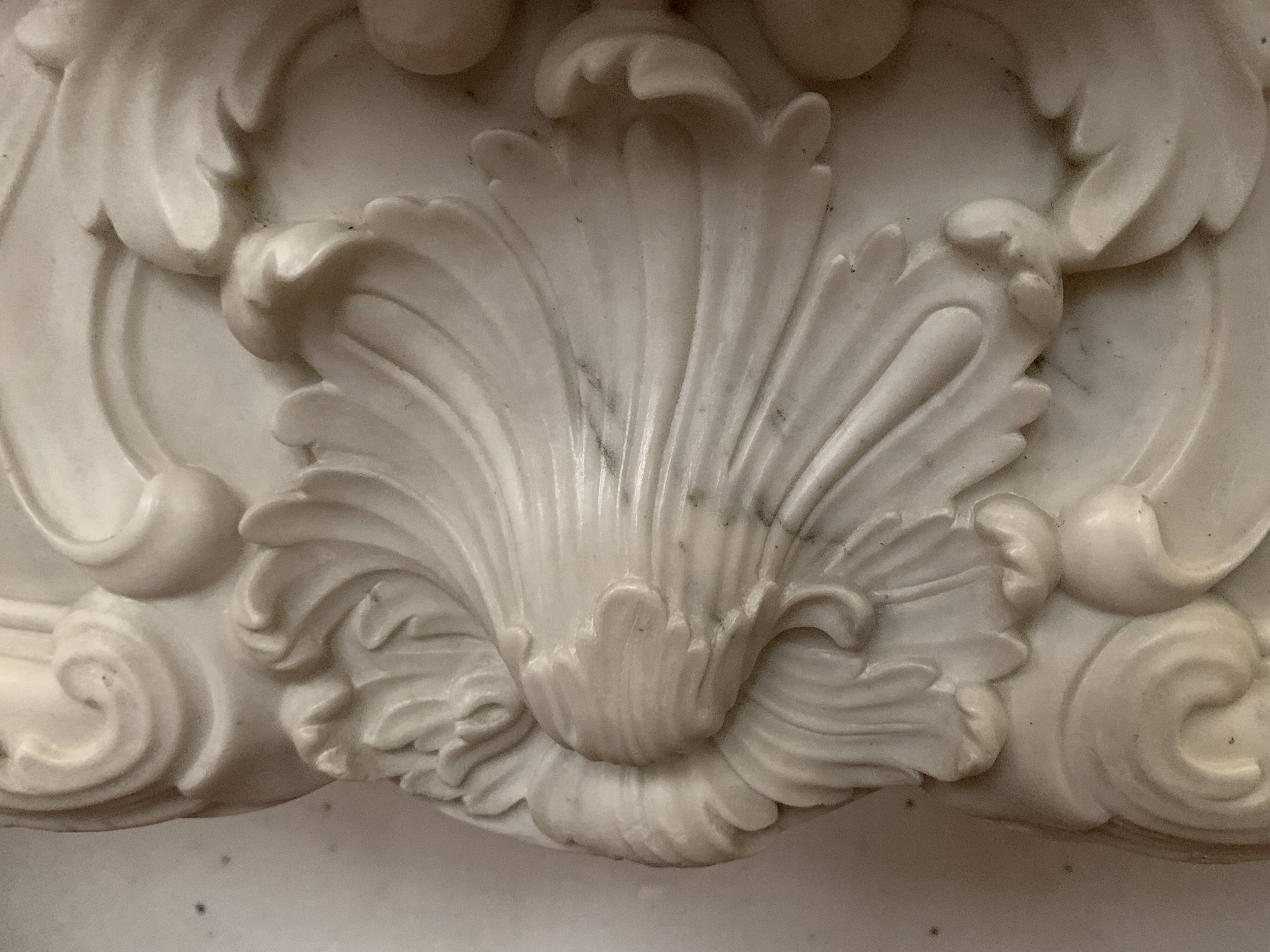 Louis XV style fireplace in white Carrara marble, 19th century