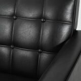 Swedish AB Futura teak and faux leather armchair