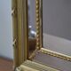 Large mirror with wooden gilded and carved frame.