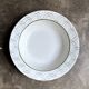 Small round hollow dish by Christian Dior in Italian earthenware
