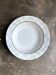 Petit plat rond creux Christian Dior en faïence italienne