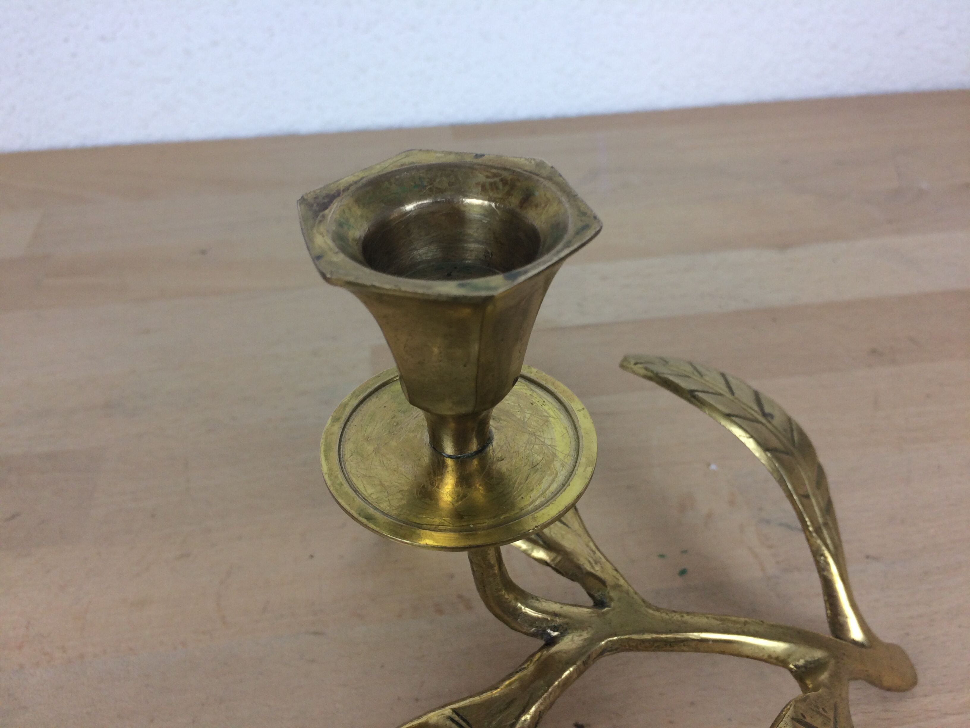 Candle holder flower leaves in golden brass