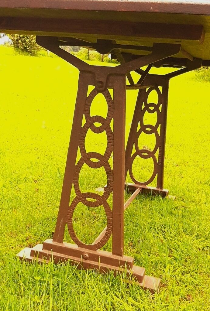 Bistro table, art deco cast iron feet, wood tray