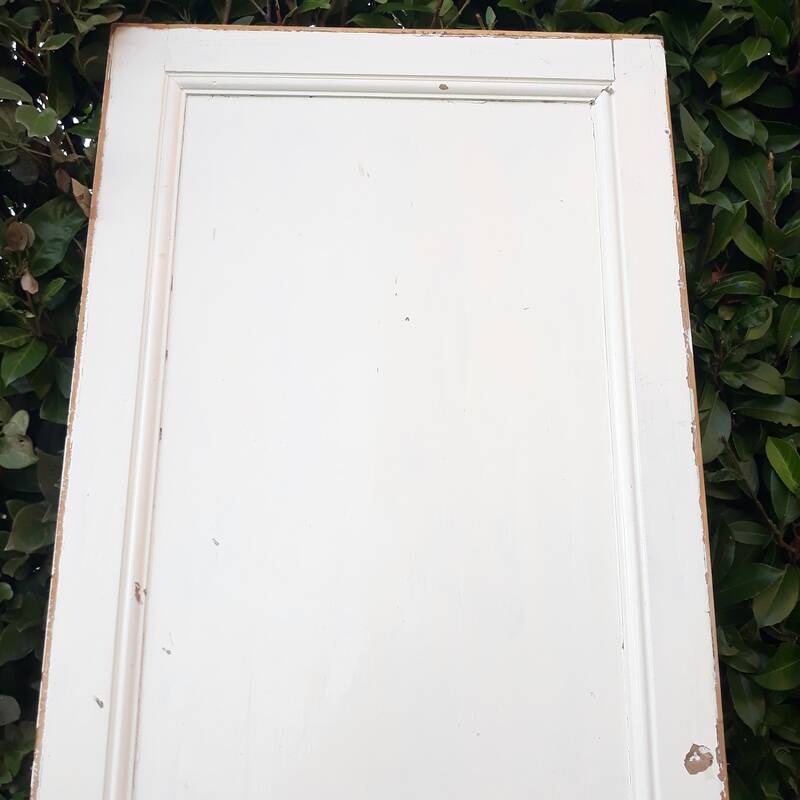 Communication door H220xW80.5cm, old panelled with moulding.