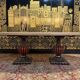 Oval oak dining table with vase legs