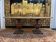 Table à manger ovale en chêne et pieds vases