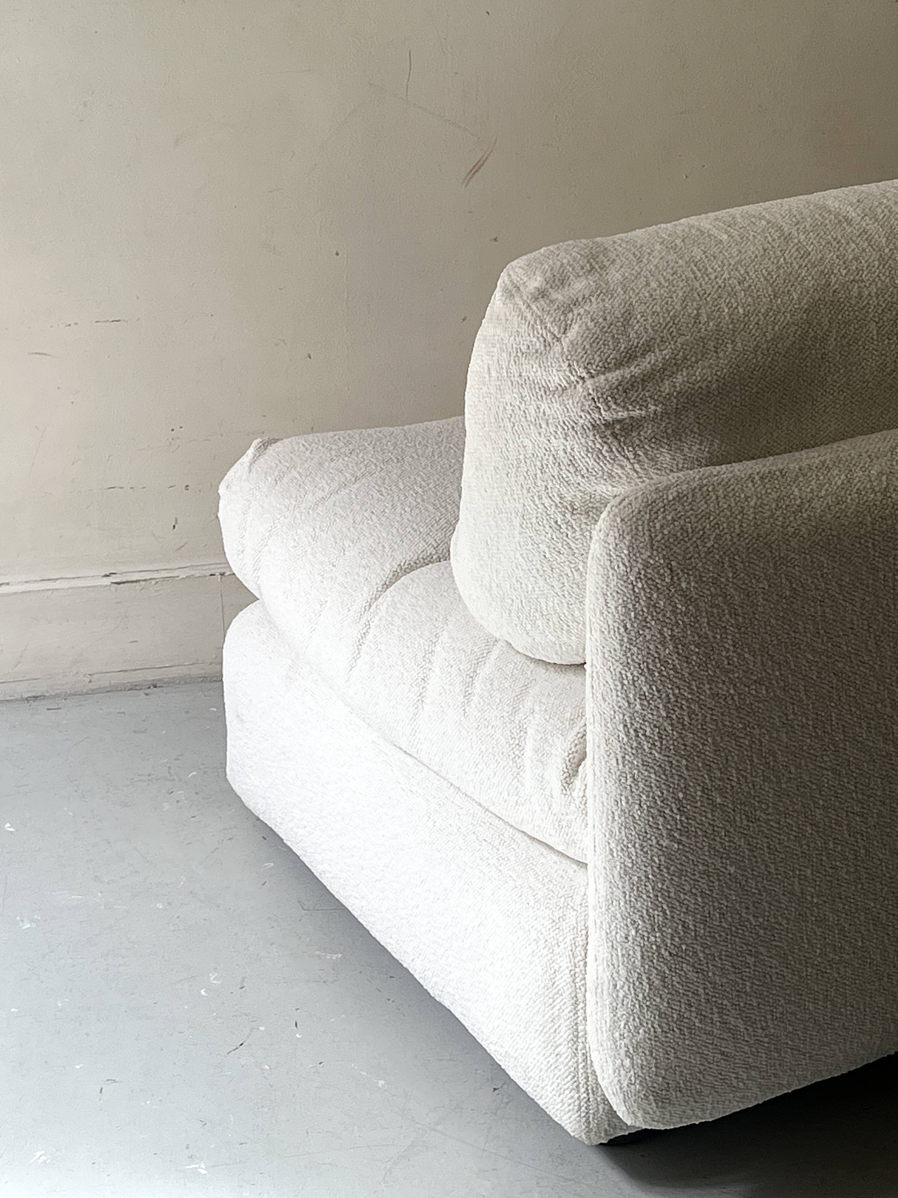 Italian off-white chenille armchair with a wooden base, 1970s design.