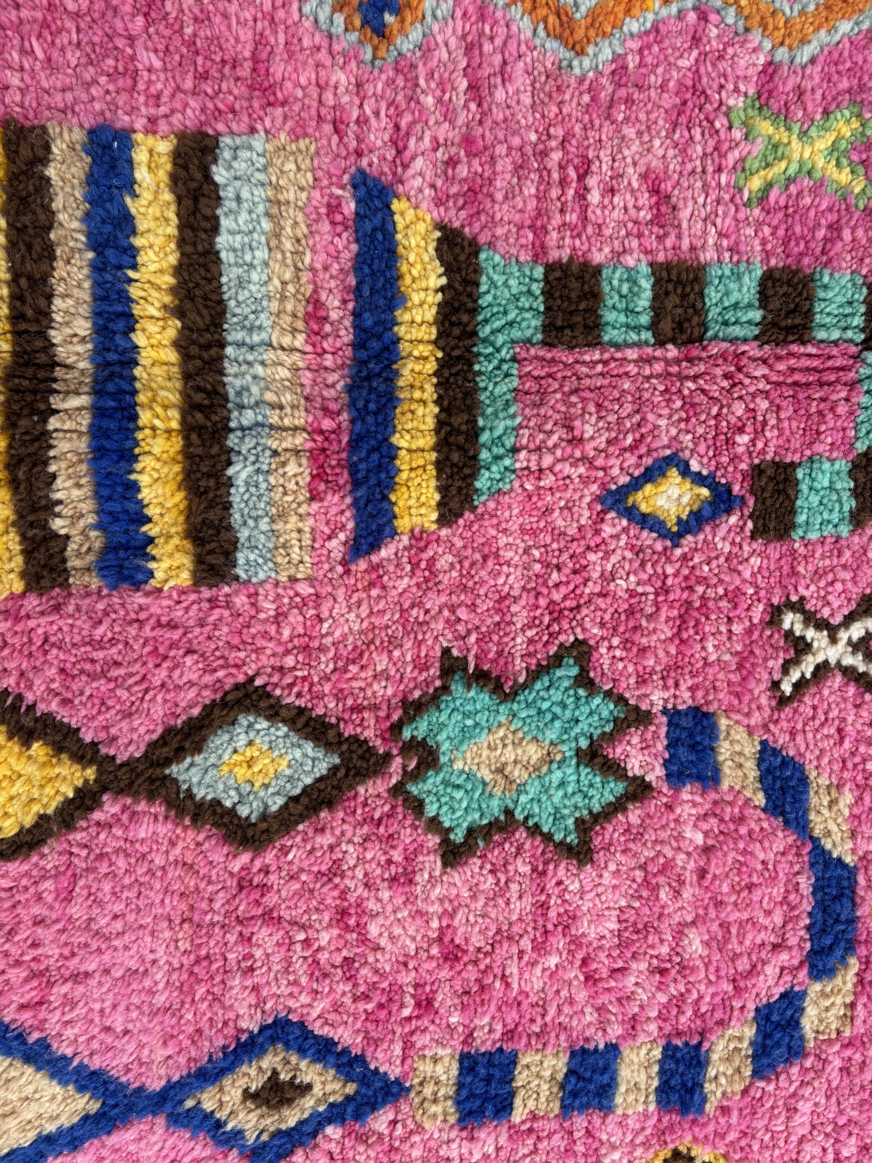 Boho chic Moroccan pink wool rug