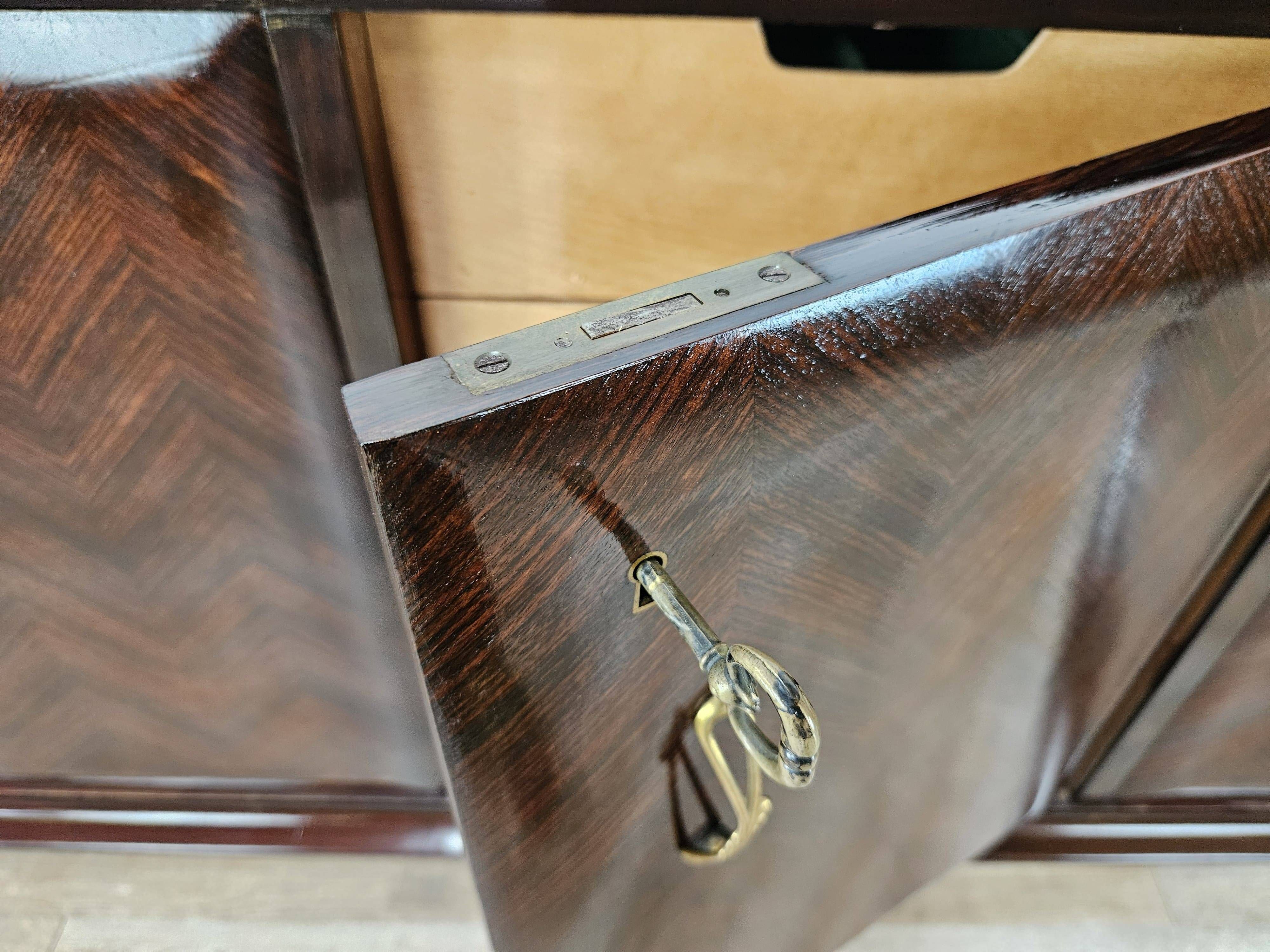 Mahogany sideboard with a glass top, 1960