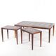 Set of coffee tables in rosewood and ceramic.