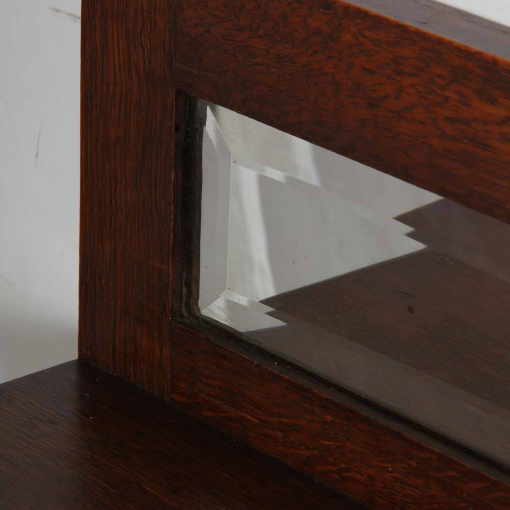 Shelf-shaped mirror, work from the early 20th century.