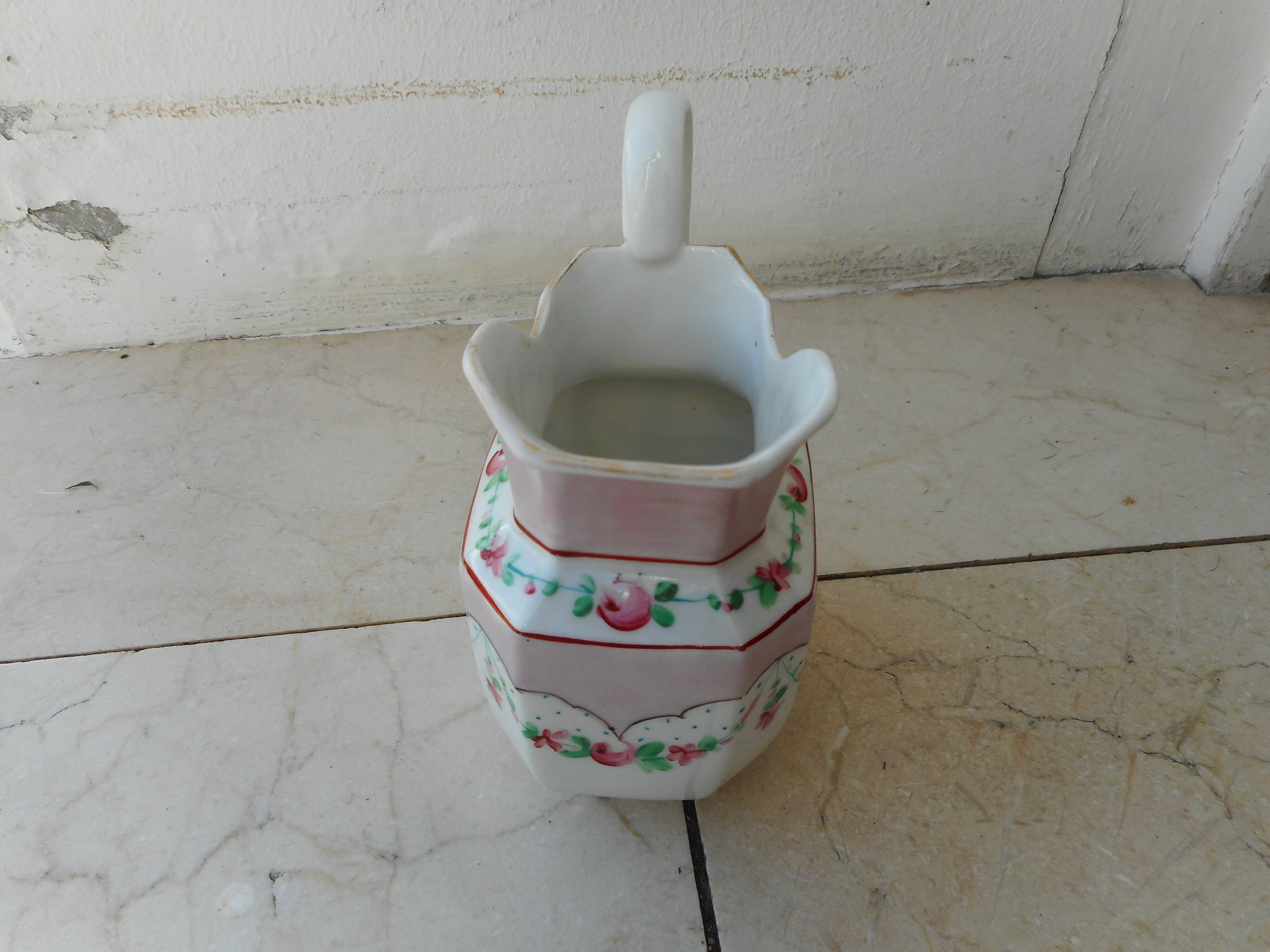 Ancient porcelain pitcher