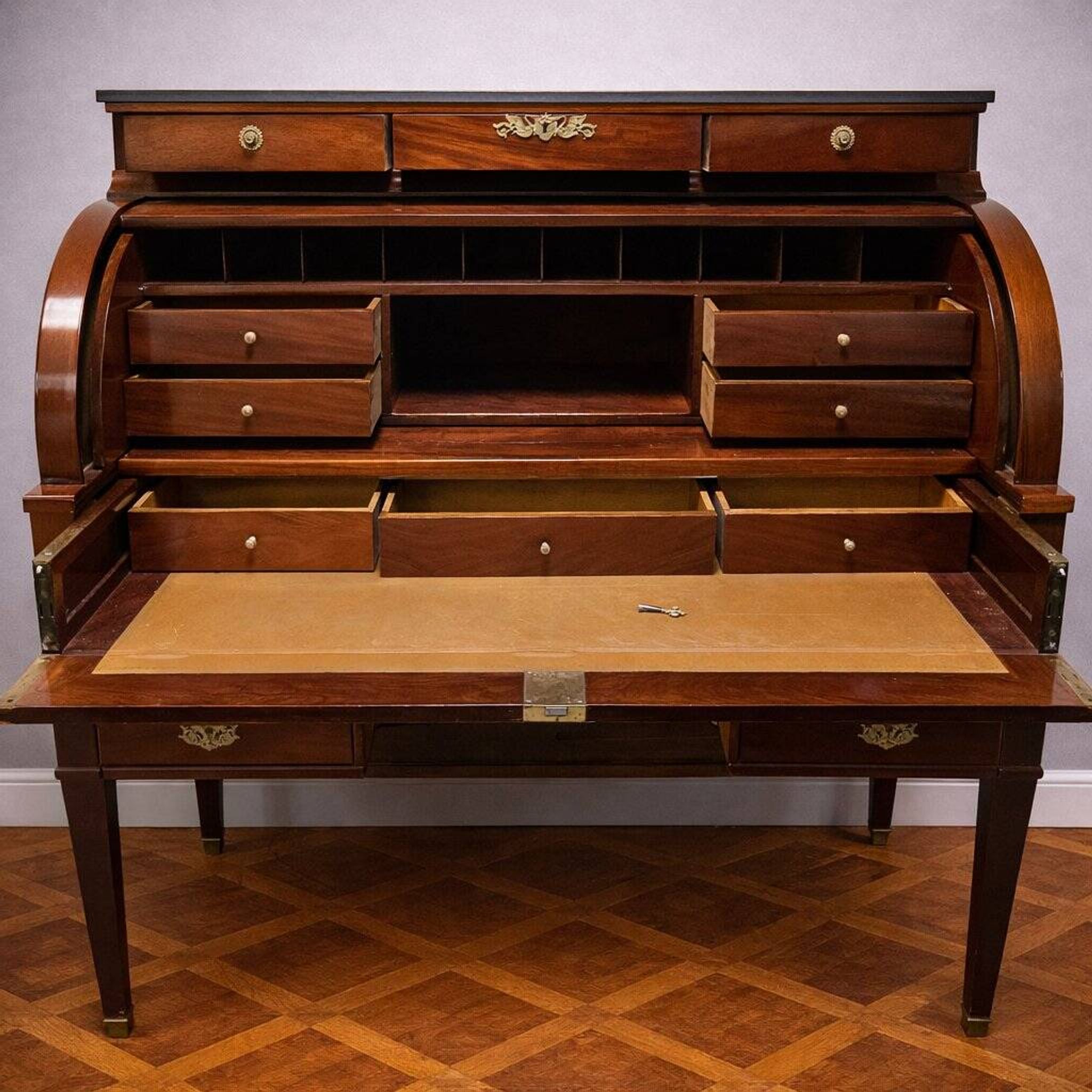 Important cylinder desk secretary in Louis XVI style made of mahogany with a system.
