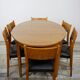 Wooden oval table and 6 matching chairs 60