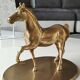Large vintage horse in exercise figurine on oval base, in polished brass 26 x 19 cm