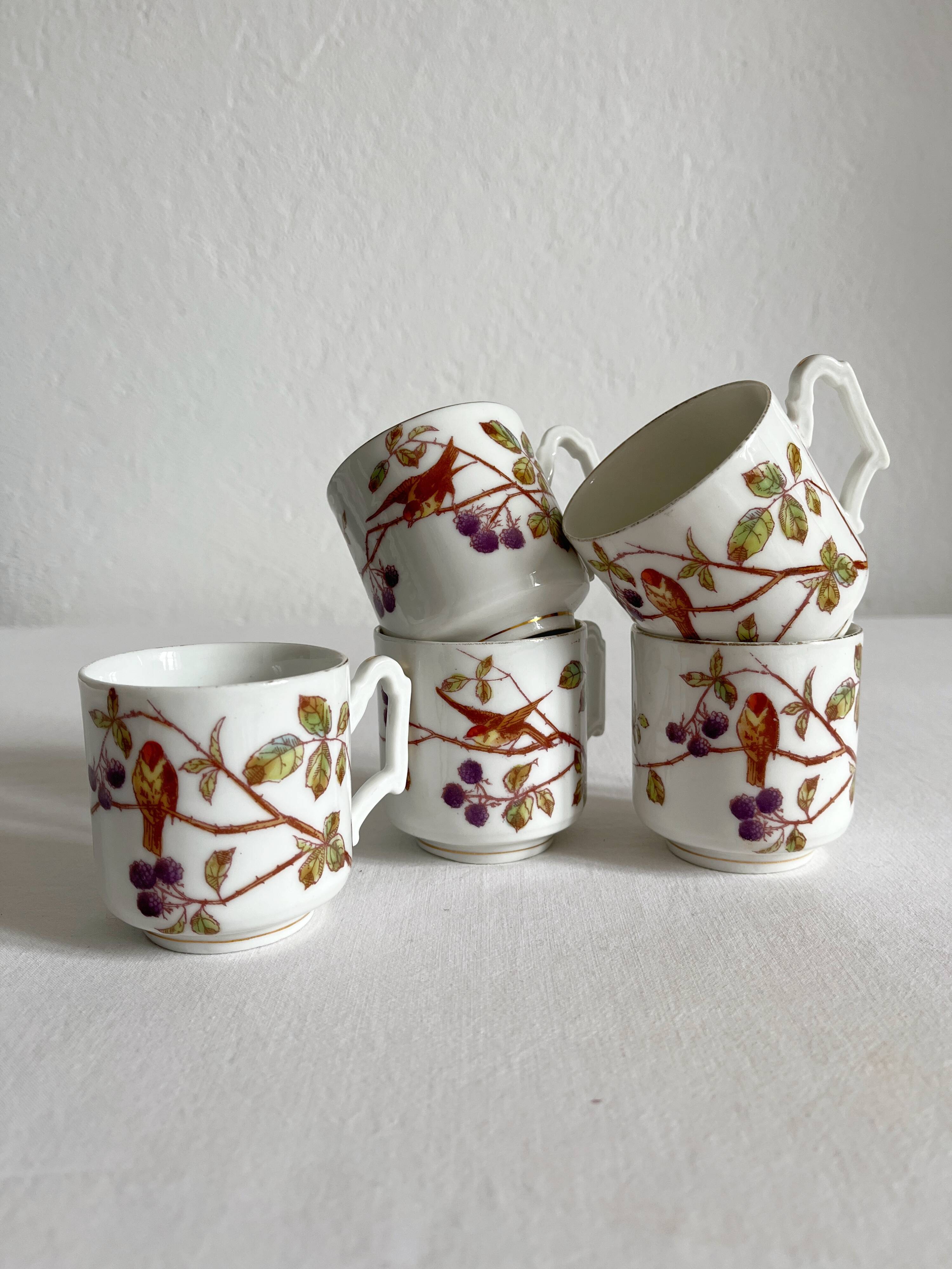 5 antique porcelain coffee cups decorated with birds