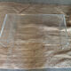 Vintage coffee table in curved transparent plexiglass – 70s/80s