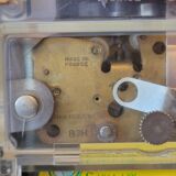 Vintage wall clock in electric smi formica with date