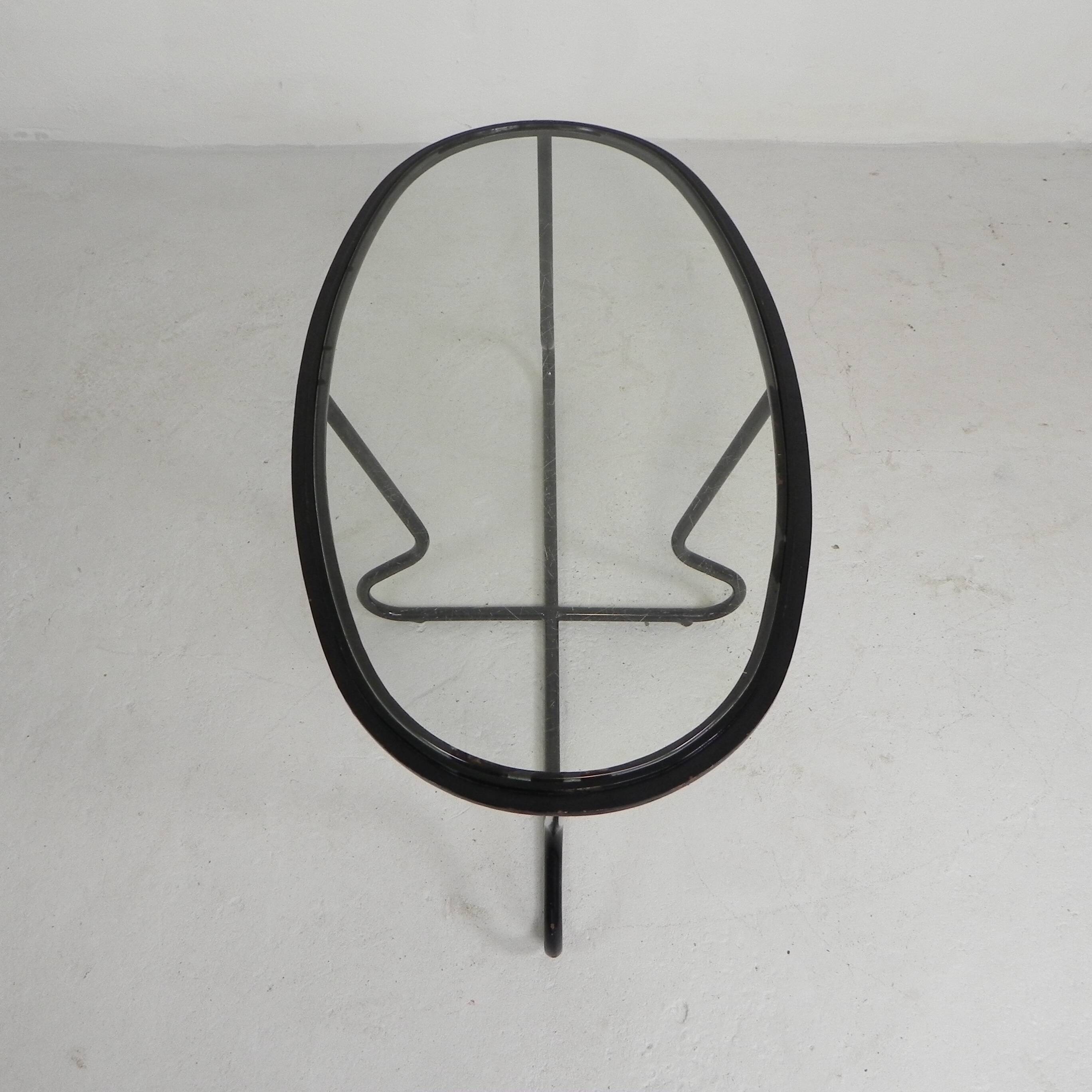 Set of 4 armchairs and a coffee table with tubular structure in Bauhaus style, 1950s.