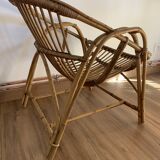Fauteuil coquille en rotin