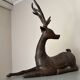 Solid bronze deer 20kg (1979), with period sales certificate.