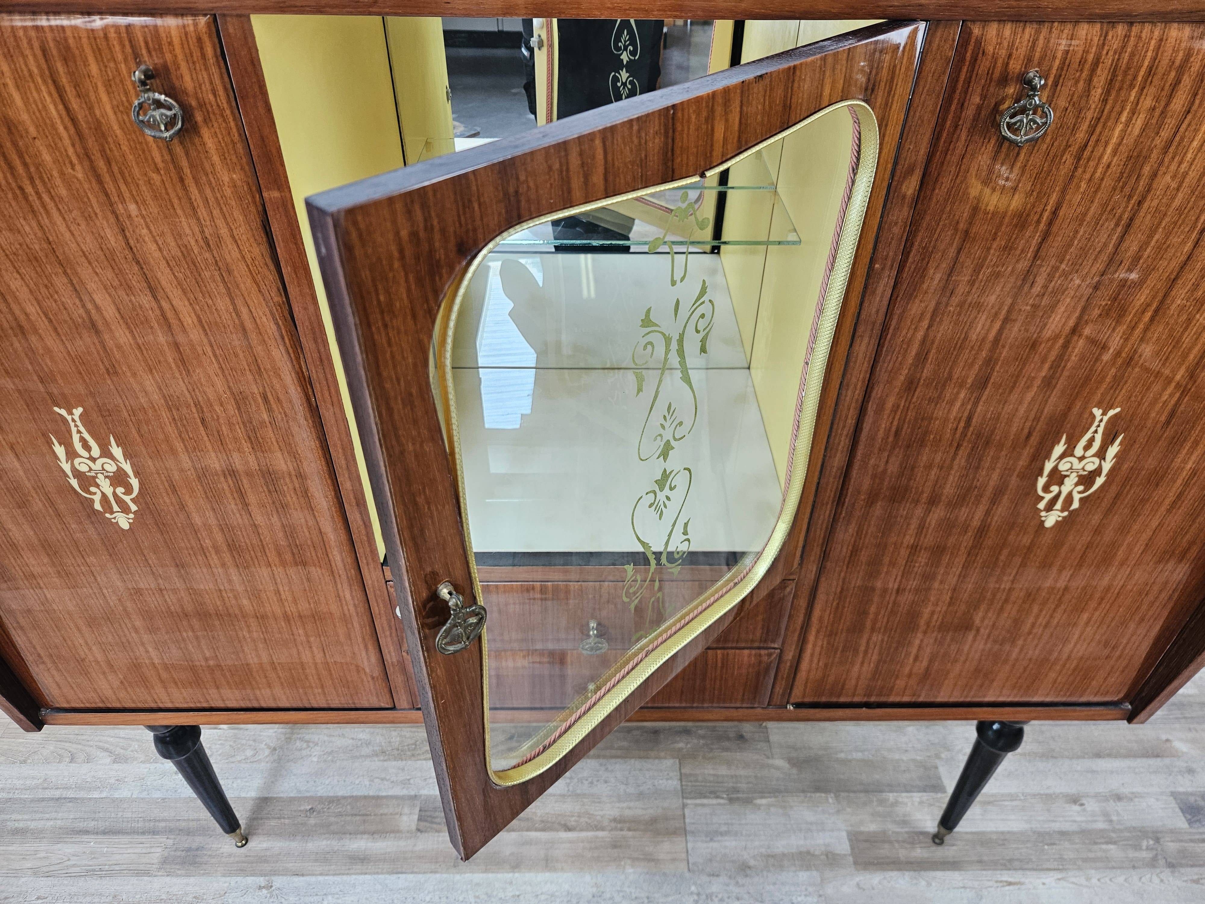 Mid-century 1960s mahogany showcase with glass top