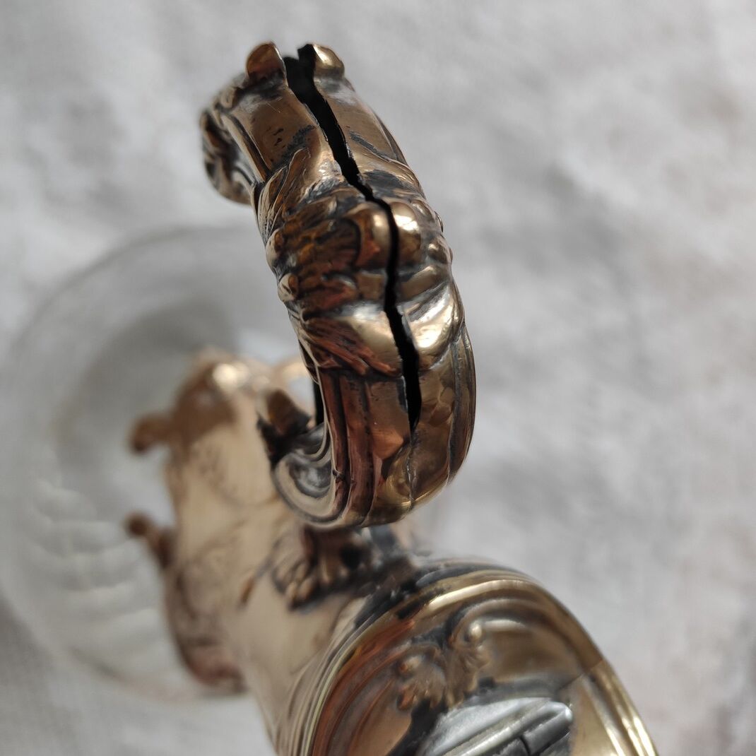 Cut crystal ewer and brass