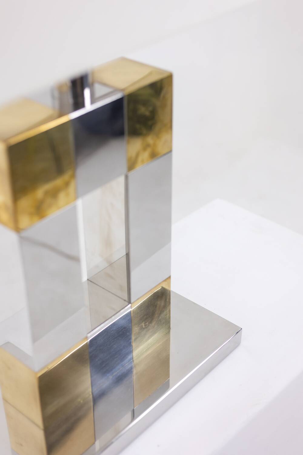 Geometric lamp in silver and gold metal. 1970s.