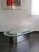 Vintage coffee table with glass and chrome metal.
