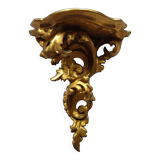 Baroque style golden shelf.