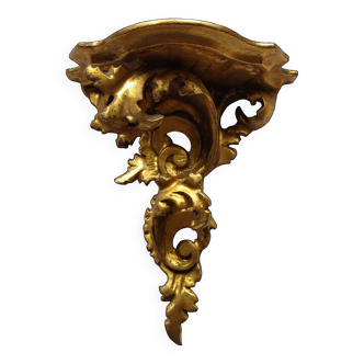Etagère dorée style baroque.