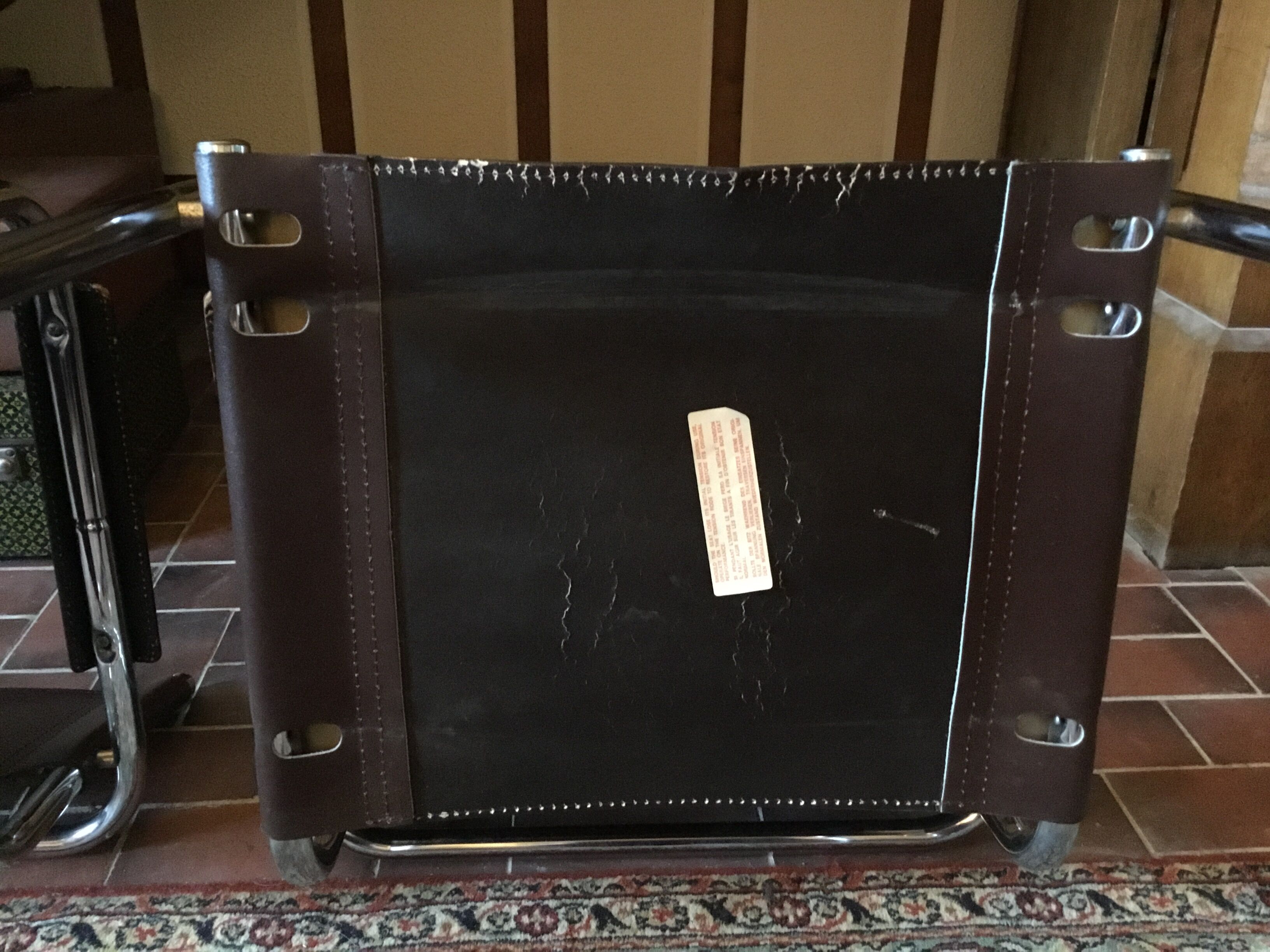 Leather and steel armchairs