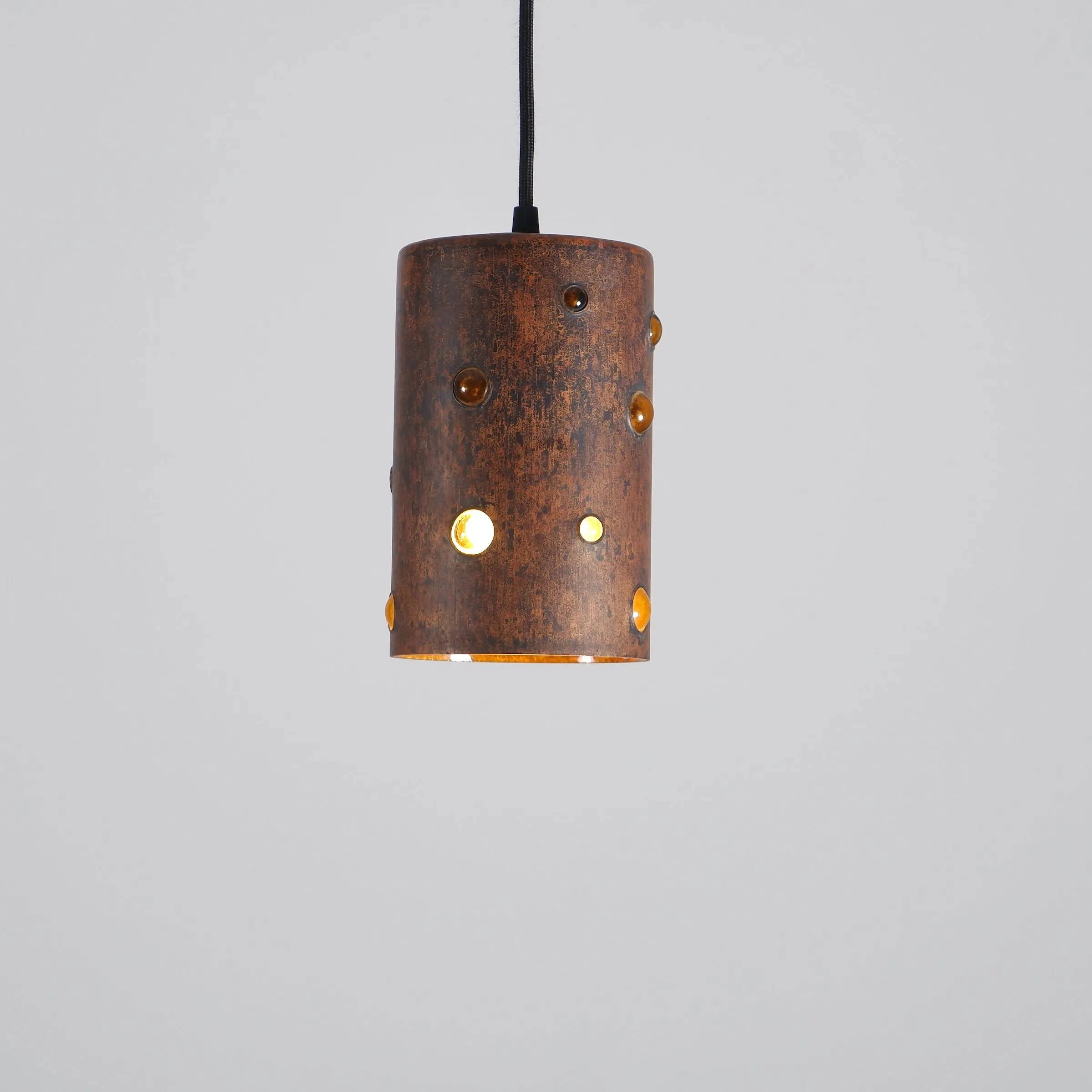 Cylindrical brutalist hanging lamp in copper / glass by Peill & Putzler