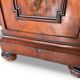 A pair of antique walnut bedside tables from the 1890s.