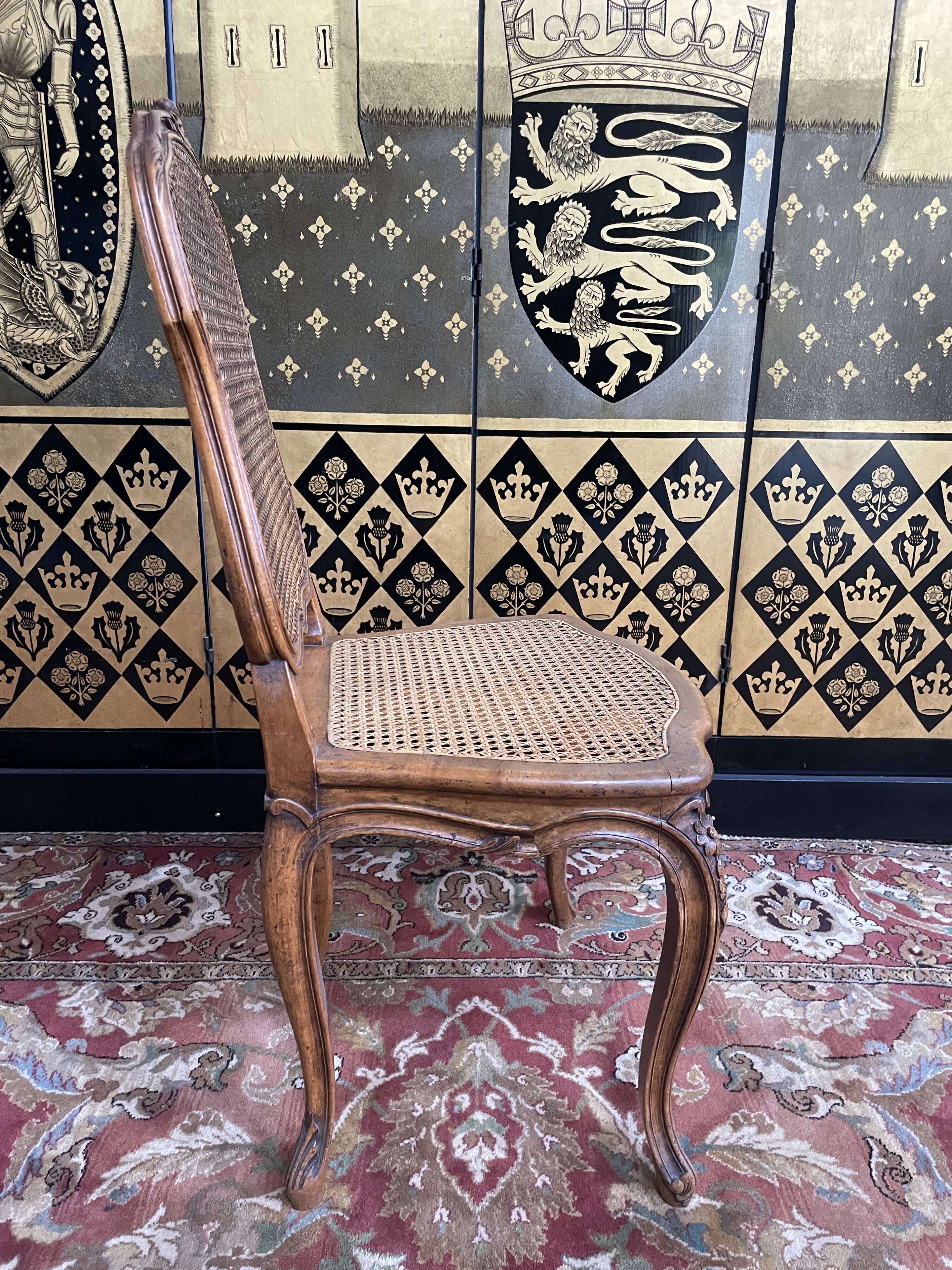 Suite of 8 Louis XV style chairs in canning