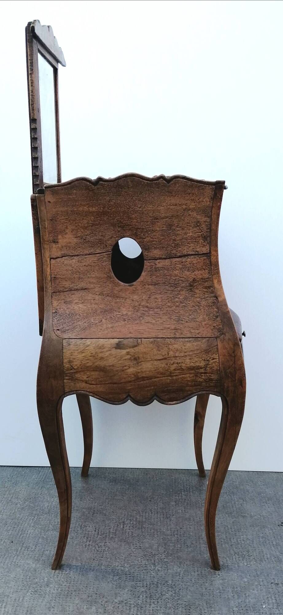 Belly bedside table with Louis XV style walnut mirror early 20th century 1920.