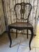 Blackened wooden chair