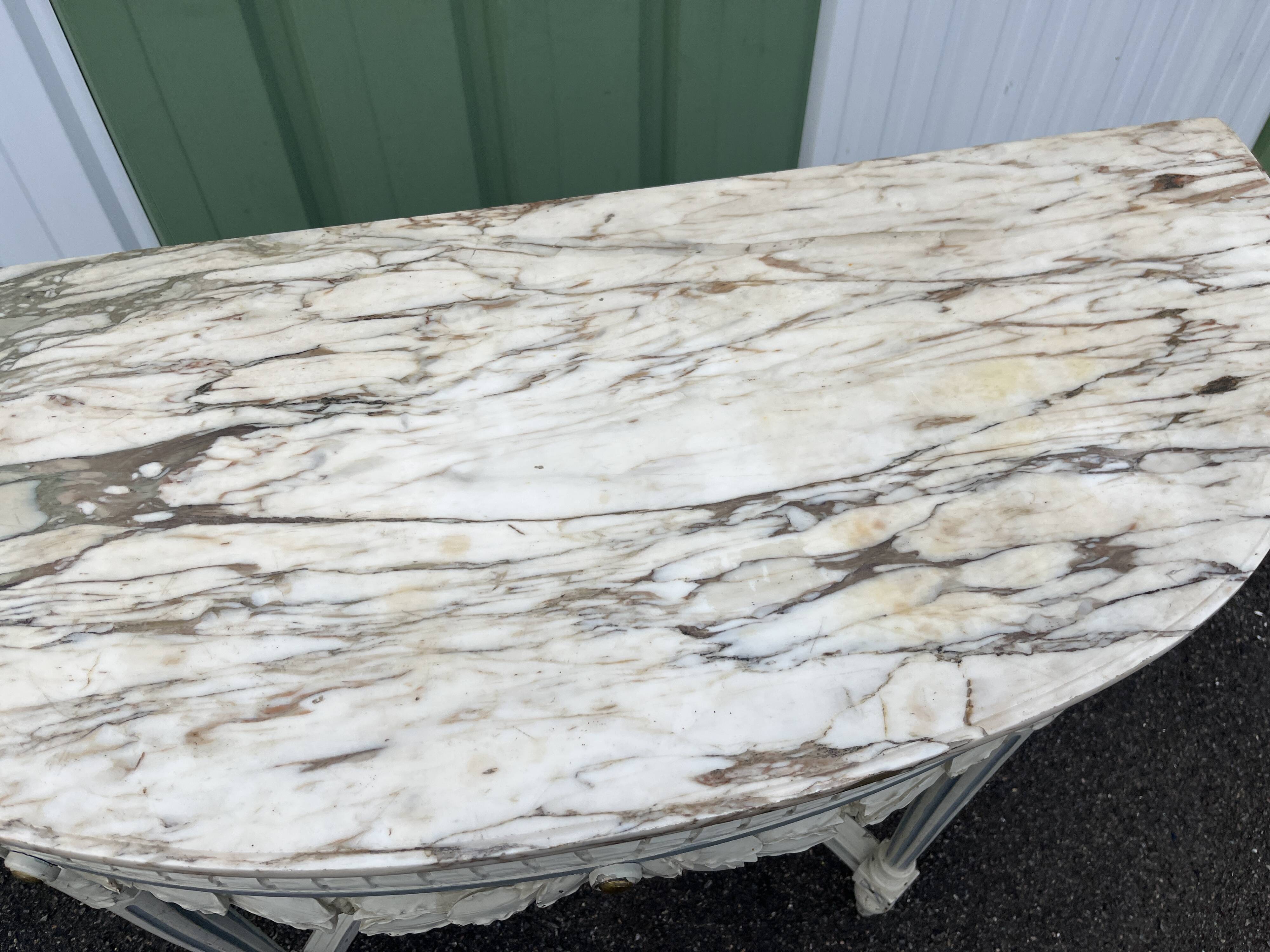 Louis XVI style half-moon console table with carved and painted wood and marble top