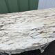 Louis XVI style half-moon console table with carved and painted wood and marble top