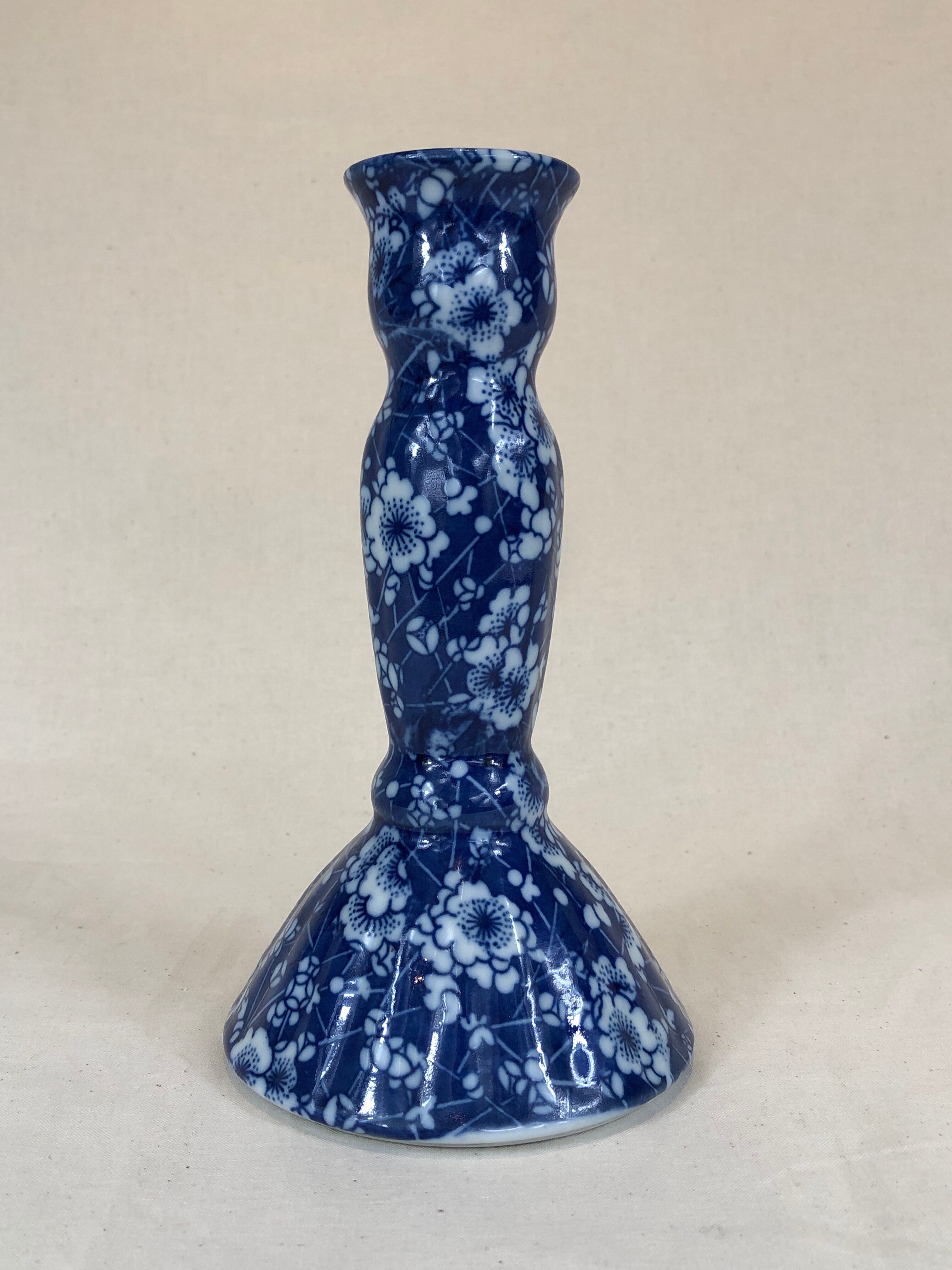 Blue ceramic candle holder pattern small white flowers