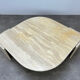 Table basse travertin forme œil par Roche Bobois