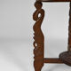 Asian coffee table carved with dragons and peacocks, Indonesia, early 20th century