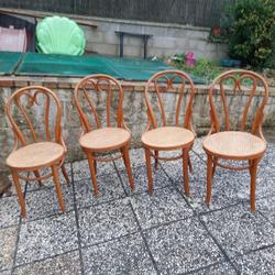 4 tanned bistro chairs