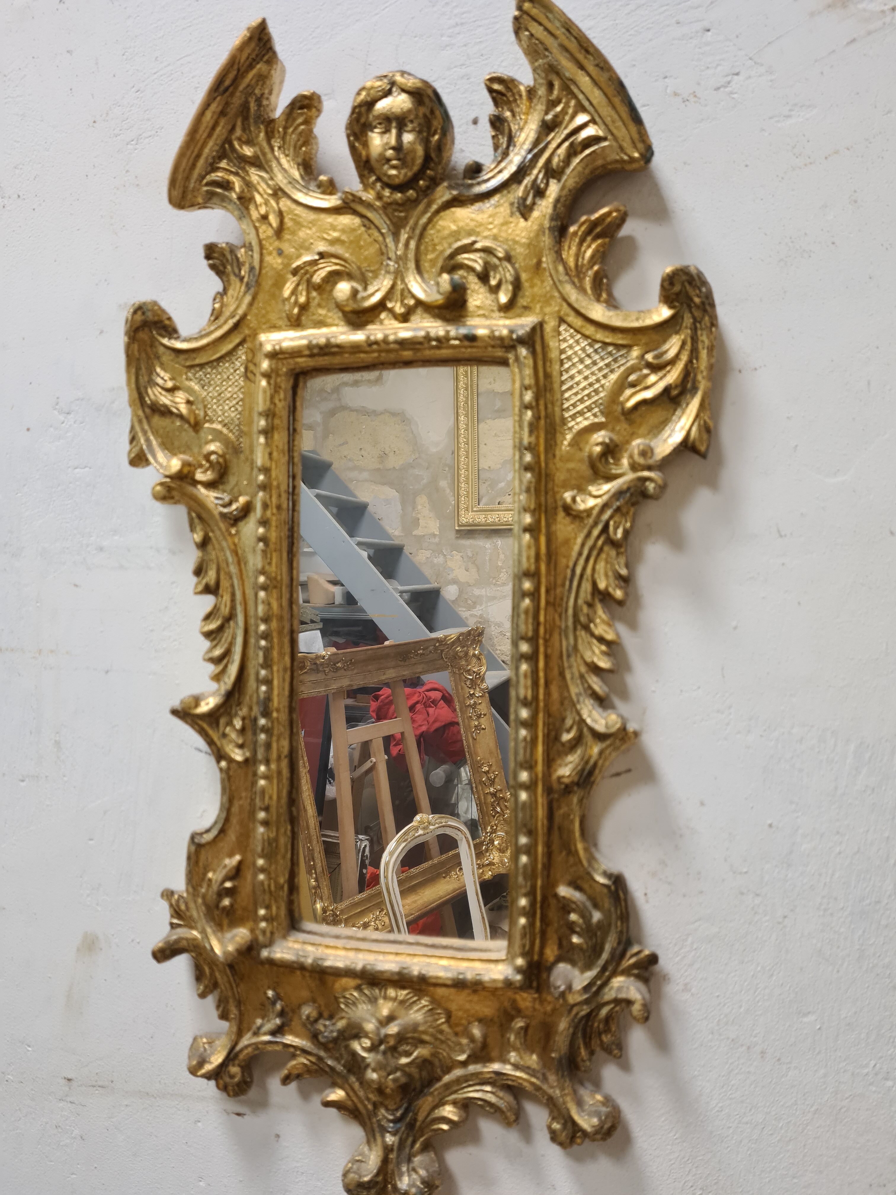 Mirror in gilded plaster with leaf 61x32