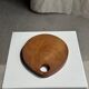 Small circular teak monoxyle cutting board with handle 22 x 13.